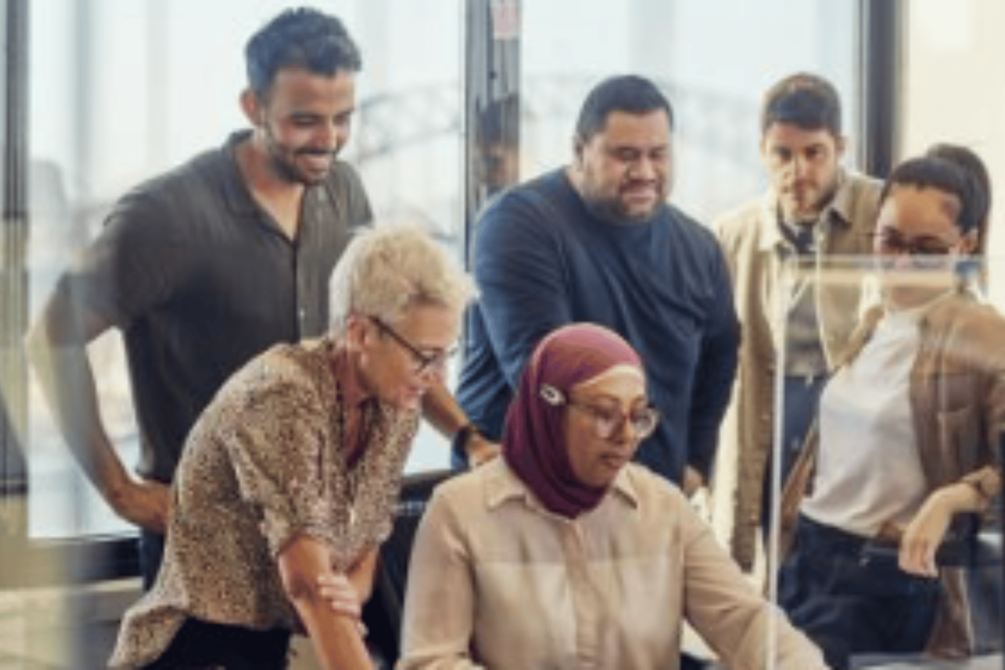 Employees collaborating together